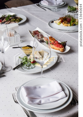 Served for banquet restaurant table with dishes Served for banquet restaurant table with dishes 53640644