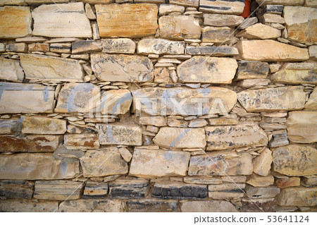 Fragment of wall of large and small stones. Cyprus 53641124