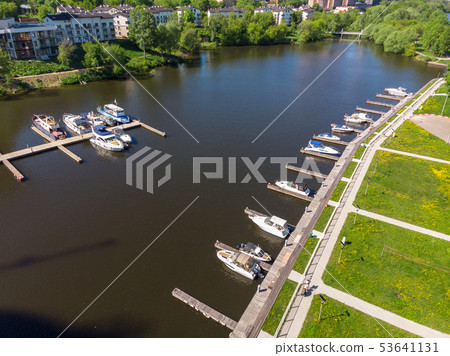Yacht parking on the river and Khimki city. Russia 53641131