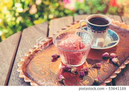 a cup of Turkish coffee and rose water a cup of Turkish coffee and rose water 53641189