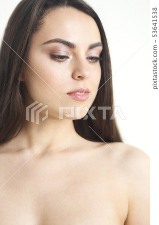 Portrait of beautiful woman on white background 53641538