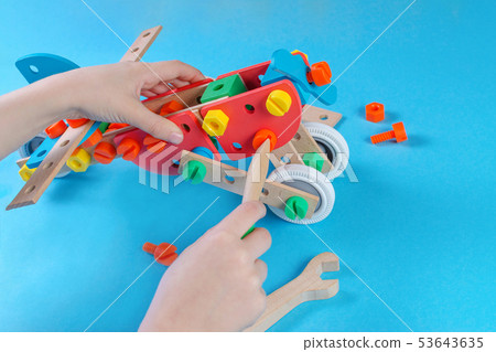 child playing with constructor and make a plain child playing with constructor and make a plain 53643635