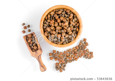 dog food in a bowl and snack like bone on white dog food in a bowl and snack like bone on white 53643636