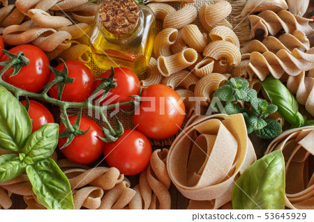 Whole wheat pasta, vegetables,  herbs and olive 53645929