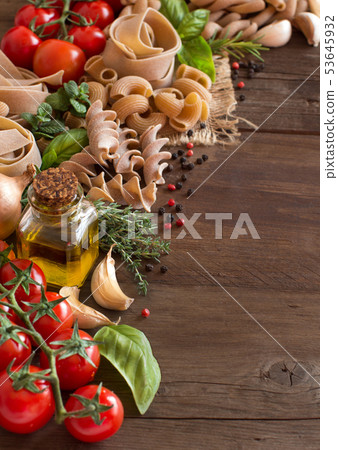 Whole wheat pasta, vegetables,  herbs and olive 53645932