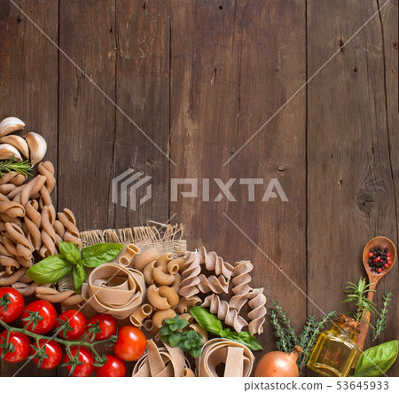 Whole wheat  pasta, vegetables,  herbs and olive 53645933