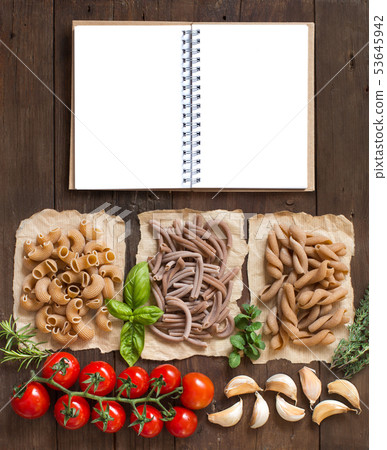 Whole wheat  pasta with herbs and vegetables 53645942