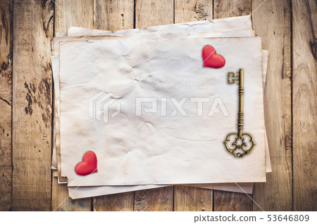 Old key and red heart on Old paper vintage on wood Old key and red heart on Old paper vintage on wood 53646809