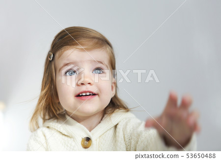 Cute toddler girl looking away isolated on white 53650488