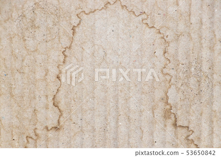 Water stained on brown corrugated packaging 53650842