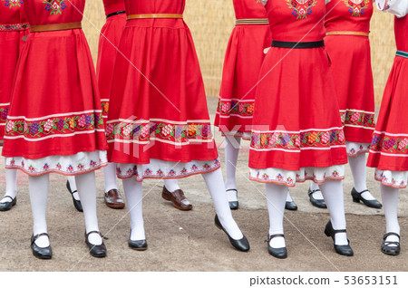 People in traditional costumes dance bulgarian People in traditional costumes dance bulgarian 53653151
