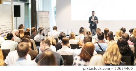 Male business speaker giving a talk at business conference event. Male business speaker giving a talk at business conference event. 53654460