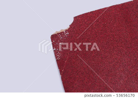 Red sandpaper isolated on white background. 53656170