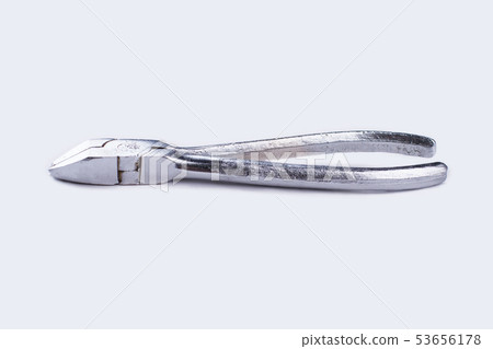 Silver pliers on a white background. 53656178