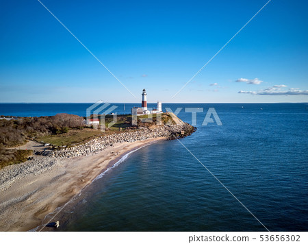 Montauk Lighthouse and beach aerial shot Montauk Lighthouse and beach aerial shot 53656302