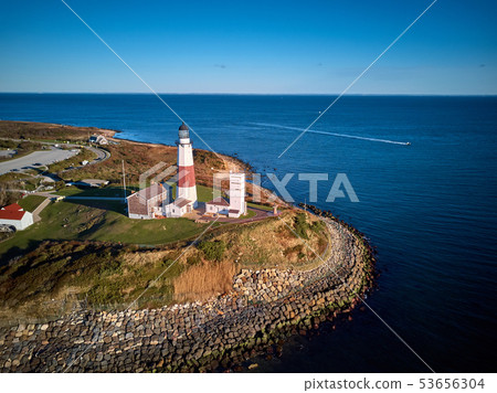 Montauk Lighthouse and beach aerial shot Montauk Lighthouse and beach aerial shot 53656304