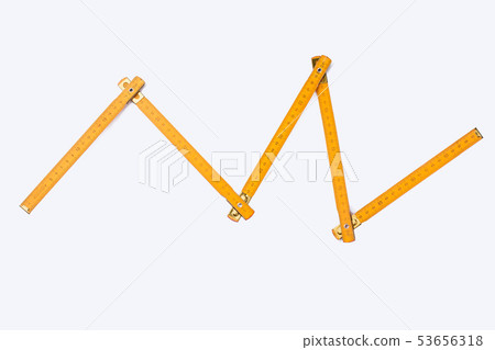 Folding ruler on white background. 53656318