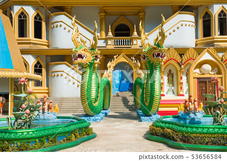 Statues of green dragons at temple in Thailand Statues of green dragons at temple in Thailand 53656584