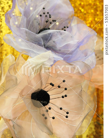 Flowers from organza for interior decoration.  53657003
