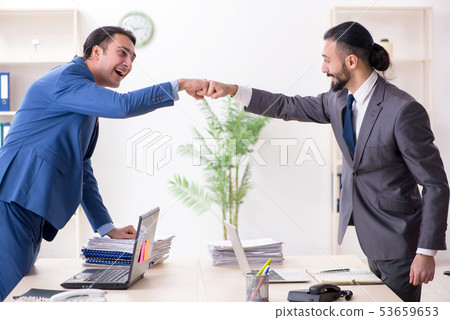 Two male colleagues in the office Two male colleagues in the office 53659653