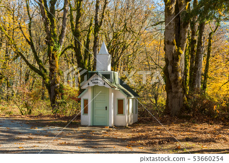 Tiny Upriver Chapel next to the Skagit River and a lush forest near Rockport 53660254