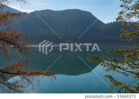 Detail of Baker Lake water, shore and trees, in Norh Cascades 53660373