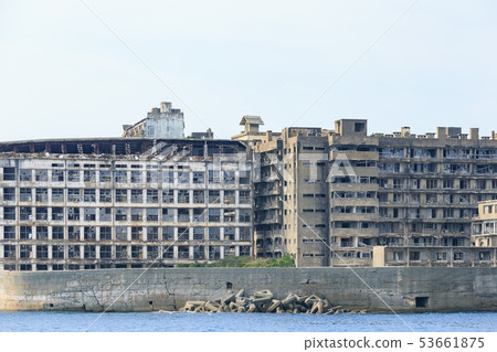 The ruins of Gunkanjima _ Hashima elementary and junior high school seen from Nagasaki _ sea 53661875