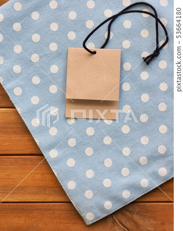 Clothing labels & cotton fabrics 53664180