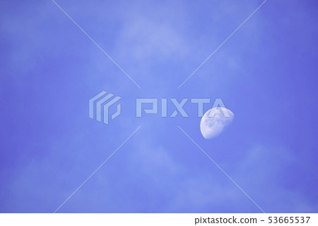 Full moon in daylight On the bright sky. 53665537