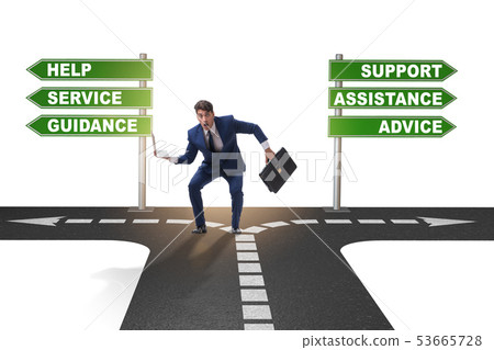 Businessman having hard choice standing at crossroads Businessman having hard choice standing at crossroads 53665728