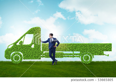 Businessman with green ecological vehicle 53665805