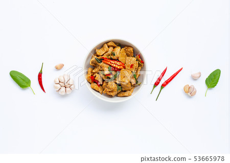 Stir-fried hot and spicy pork with basil on white Stir-fried hot and spicy pork with basil on white 53665978