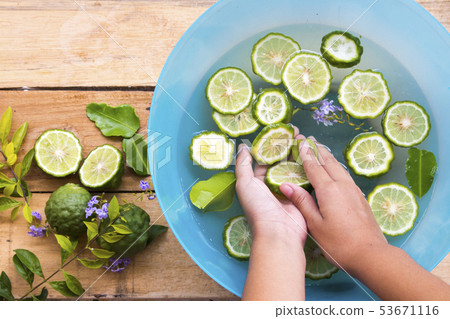 hand of girl cleaning with kaffir float on water  53671116