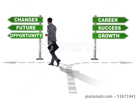 Businessman having hard choice standing at crossroads 53671941