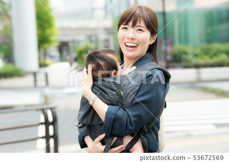 Working mother commuting child care parent and child 53672569