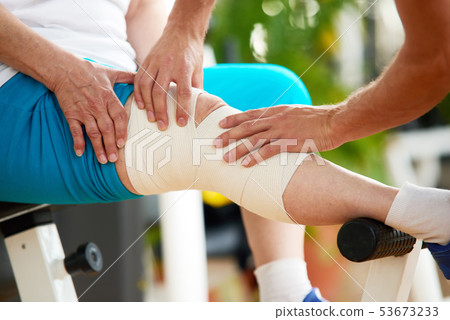 Close up woman suffering from knee pain. 53673233