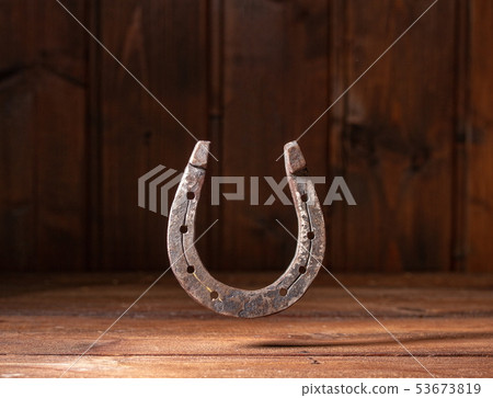 Horseshoe Wooden Background 53673819