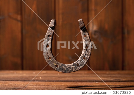 Horseshoe Wooden Background 53673820