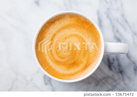 Coffee, espresso in white cup of marble table background. Top view. 53675472