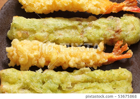 Assorted shrimp tempura and chikuwa tempura. 53675868