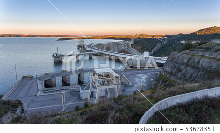 Aerial. View from the sky of the dam on the river Guadiana. 53678351