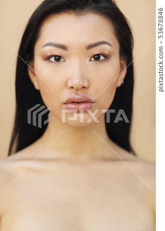 Beautiful asian model with long dark hair Beautiful asian model with long dark hair 53678846
