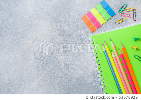 School supplies, notebooks pencils on grey School supplies, notebooks pencils on grey 53678929