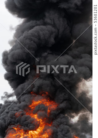 View of huge flames of red fire, clouds smoke View of huge flames of red fire, clouds smoke 53681201