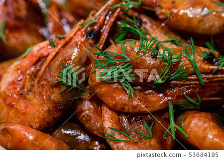 Prepared shrimps with dill close up texture background Prepared shrimps with dill close up texture background 53684195