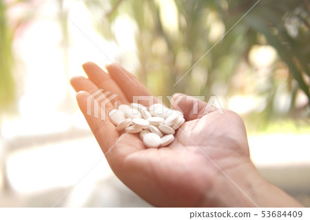 Group of Medicine pills in the hand. Group of Medicine pills in the hand. 53684409