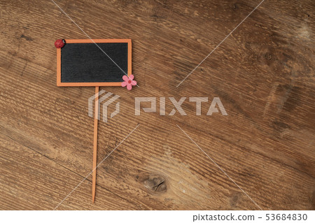 chalkboard on wooden background with copy space chalkboard on wooden background with copy space 53684830