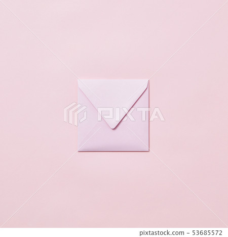 Handcraft envelope mockup for post card on a pastel pink background. Handcraft envelope mockup for post card on a pastel pink background. 53685572