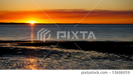 the sunset in the ocean concept of relax the sunset in the ocean concept of relax 53686059
