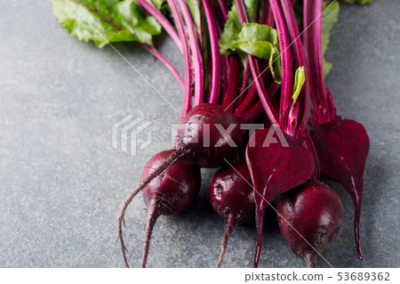 Fresh organic beet, beetroot. Grey background. Copy space. Top view. Fresh organic beet, beetroot. Grey background. Copy space. Top view. 53689362